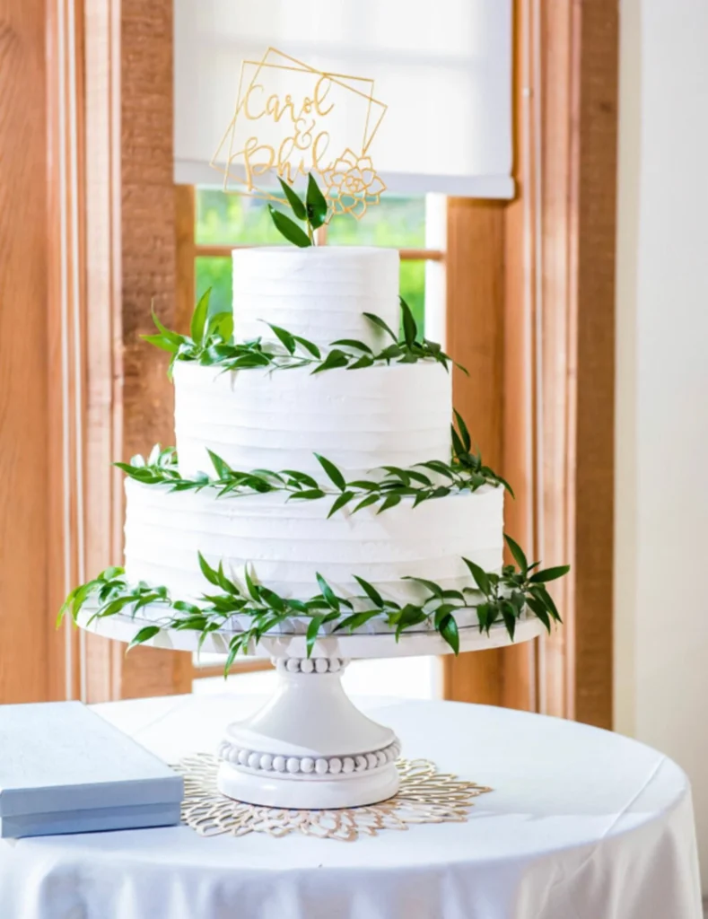 Pedestal cake stand built to support stacked wedding cakes. 